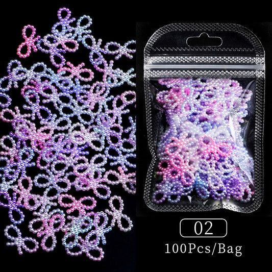 100Pcs Colorful Hollow Bowknot Nail Art Jewelry Decoration DIY Nail Crafts