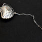 Tea strainer with handle