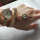Thin belt fashion ladies watch Casual three-ring winding bracelet watch Women's fashion quartz watch