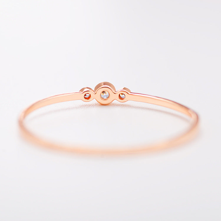 Three diamond copper zircon joint rings