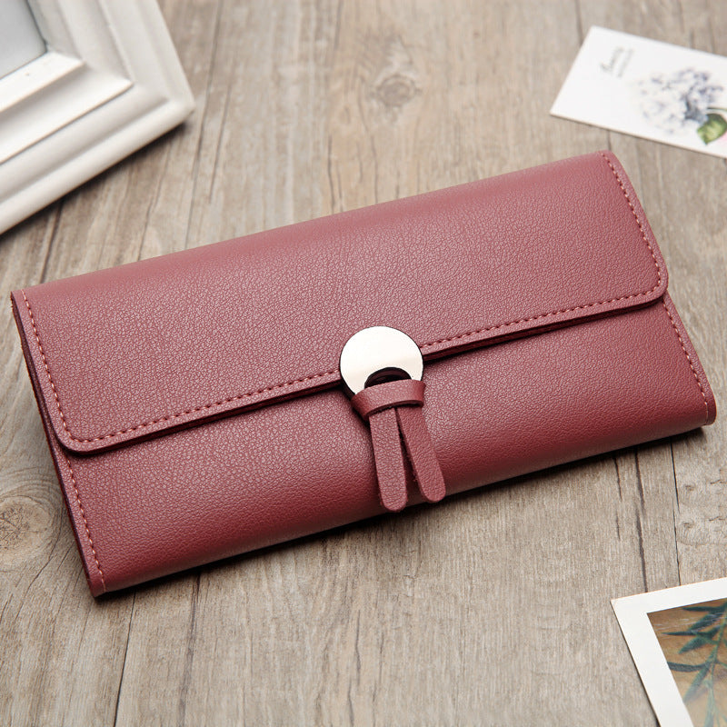 Three-fold buckle long wallet